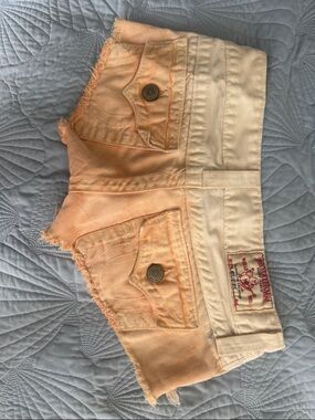 True Religion Peach and Cream Distressed Denim Jean Shorts cut off